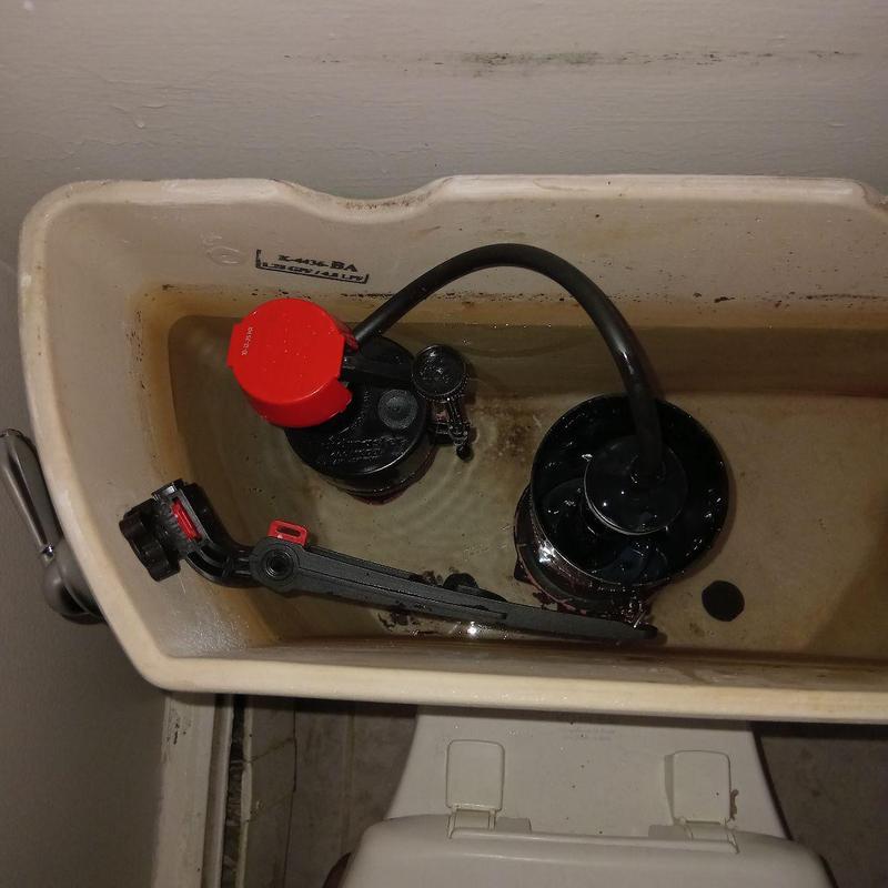 Toilet fill valve and flush handle inside tank Toilet fill valve and flush handle inside tank