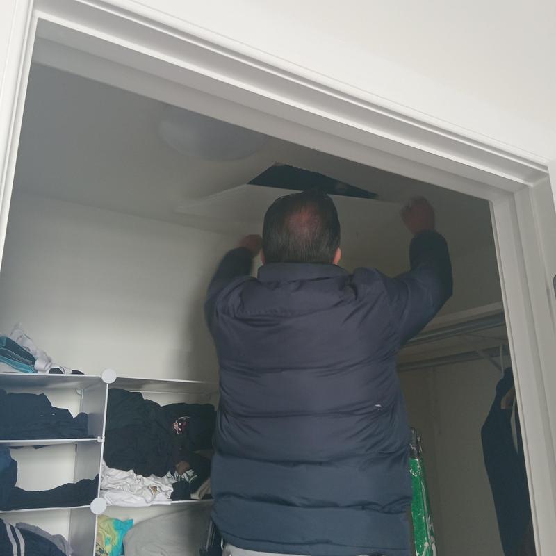Ceiling access panel inspection in residential closet