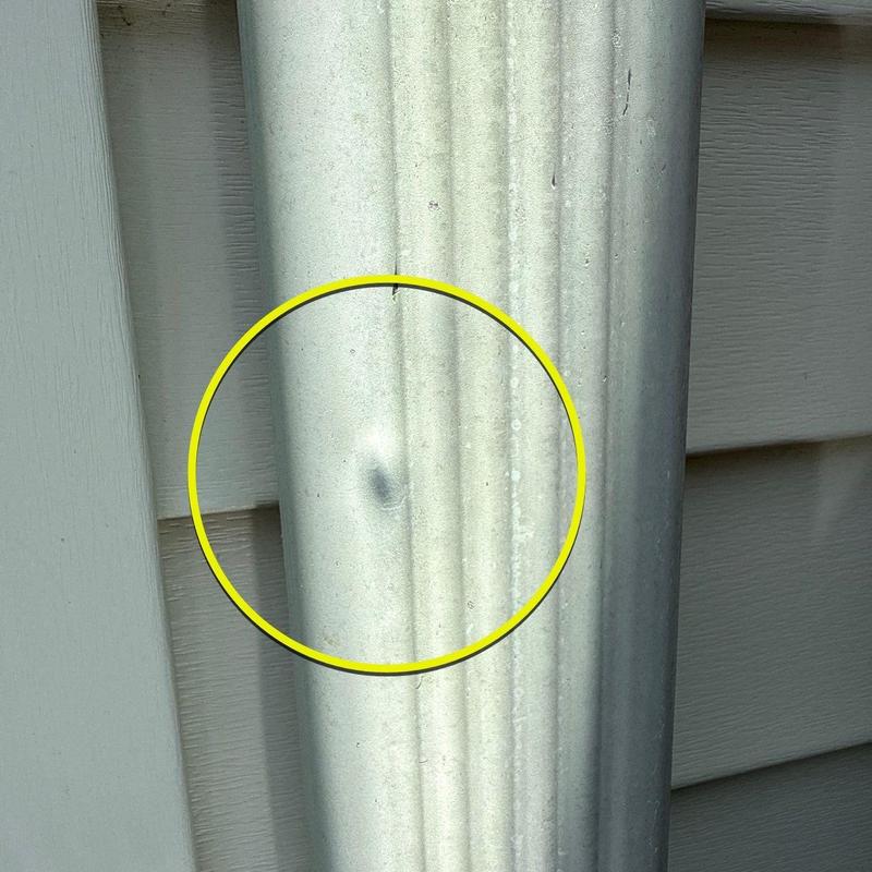 Metal downspout dent inspection with damage highlight