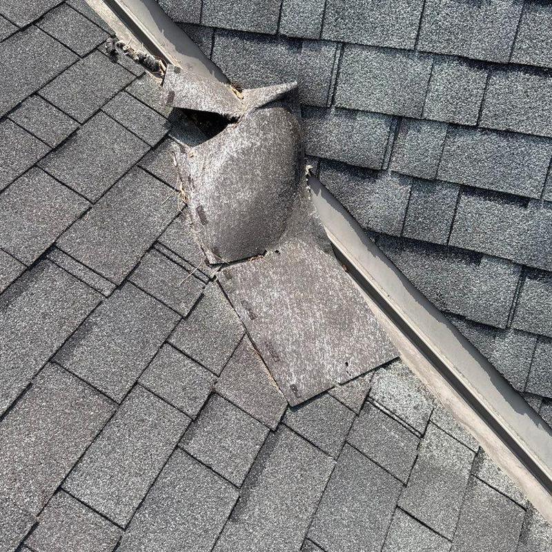 Roof valley flashing with cracked and deteriorated sealant