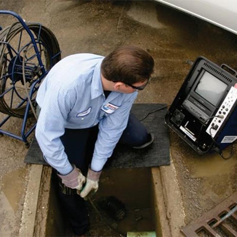 Sewer pipe video inspection with plumber equipment