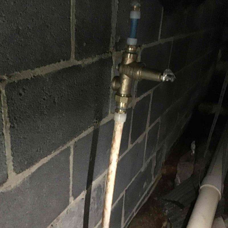 Pressure reducing valve on water service line installation