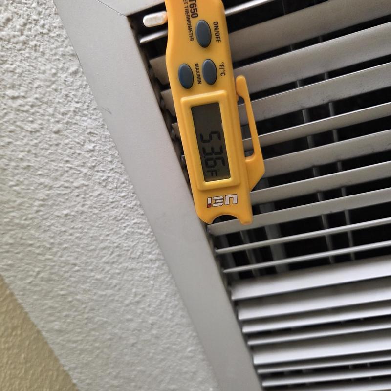 Air vent temperature check with digital thermometer