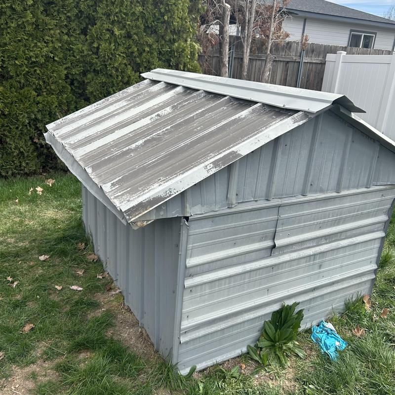 Well system metal enclosure exterior in backyard