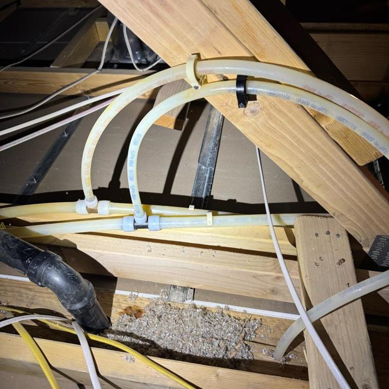 Soft water repiping with PEX connections in attic