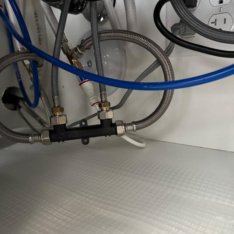 Kitchen sink hot water recirculating loop with PEX fittings