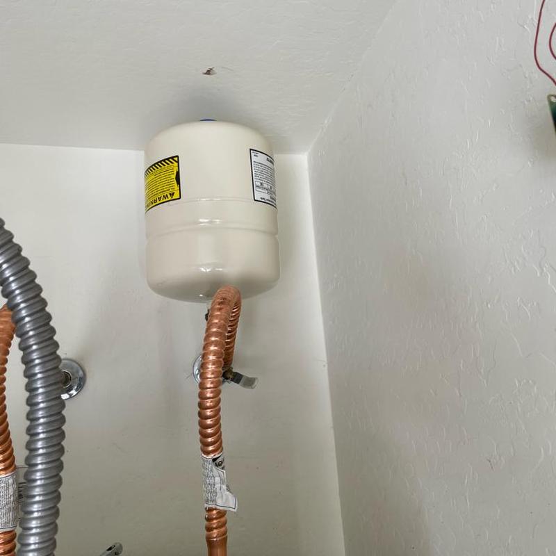 Water heater expansion tank with copper piping installation