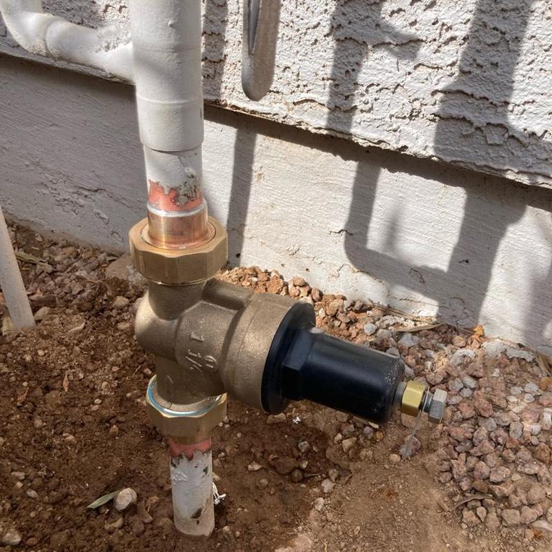 Pressure regulating valve installed on main water line