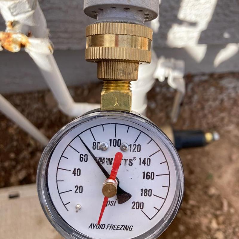 Pressure gauge on main water supply line at 70 psi