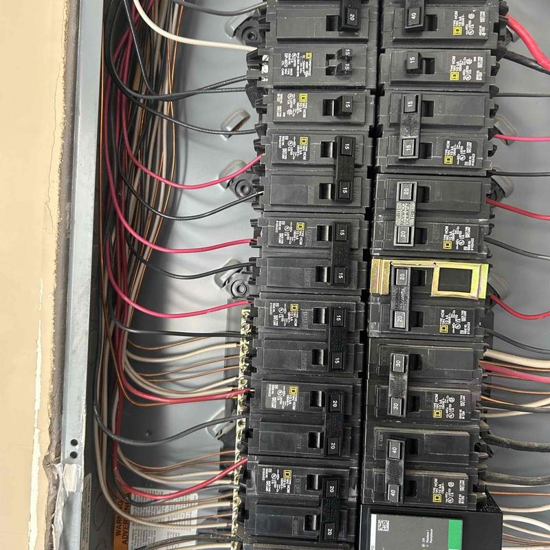 Circuit breaker panel with surge protector installation