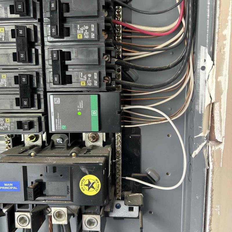 Whole home surge protector installation in breaker panel