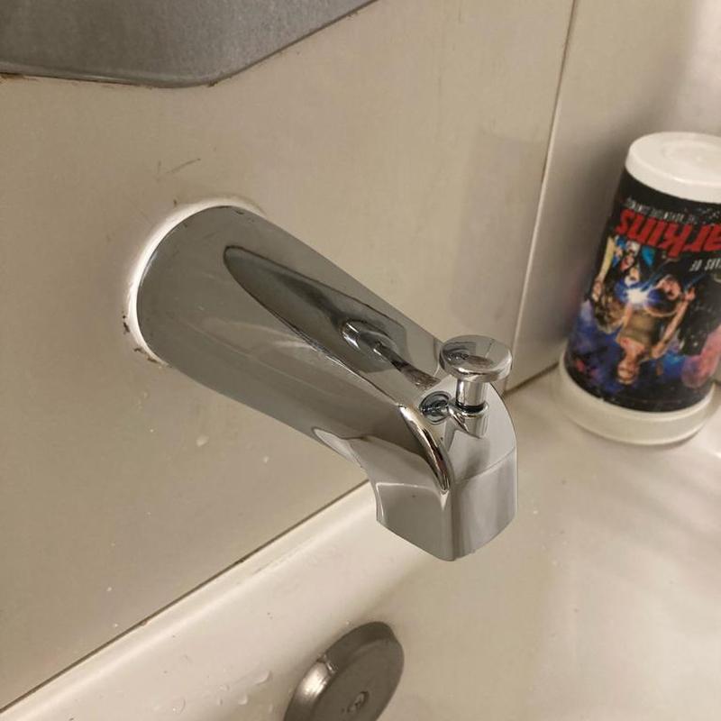 Tub spout with diverter lever on bathtub faucet Tub spout with diverter lever on bathtub faucet