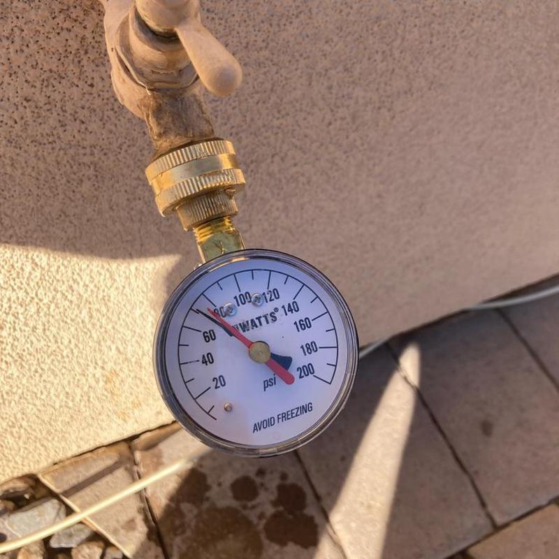 Pressure gauge on outdoor water faucet in Queen Creek, AZ