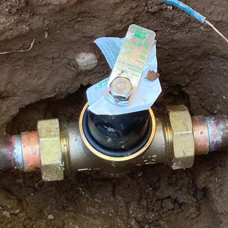 Pressure reducing valve installed in meter box ground