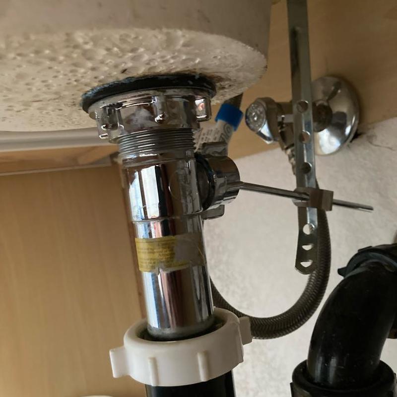 Sink drain assembly with shutoff valve and piping