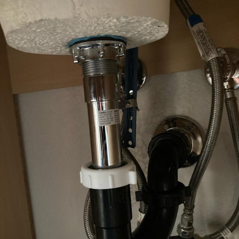 Sink drain pipe with sealing and fittings under sink