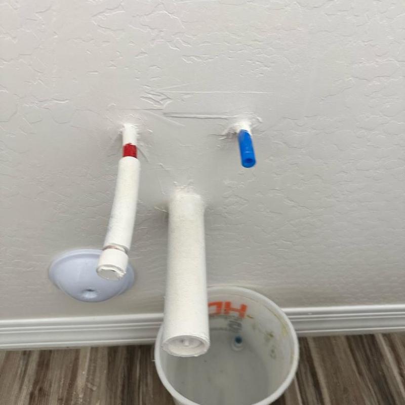 Laundry sink water supply lines with insulation installed