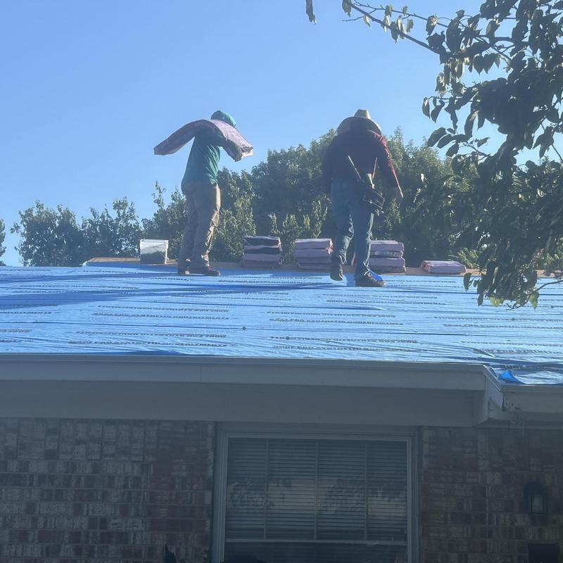 Synthetic foam roof underlayment installation on house roof