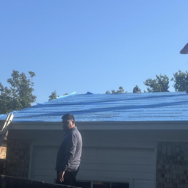Synthetic foam roof underlayment installation on residential roof