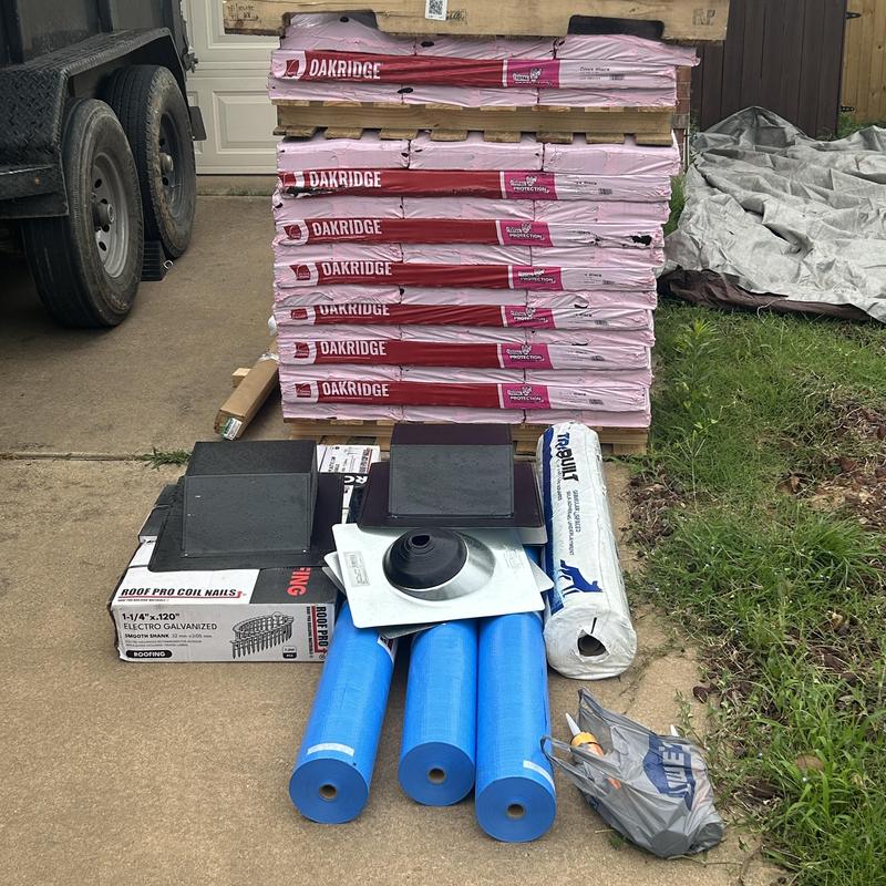Owens Corning Oakridge shingles and roofing materials laid out