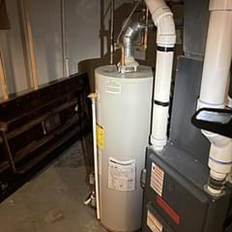 Water heater and furnace setup in basement
