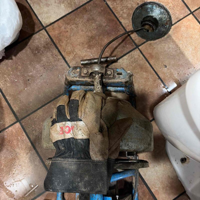 Toilet flange mainline cable cleaning with gloves