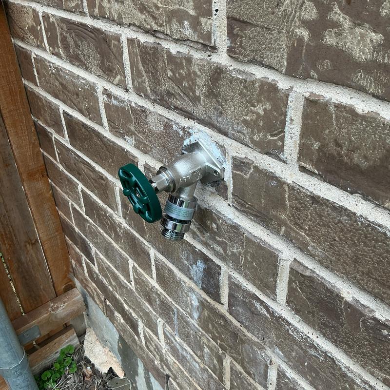 4-inch frost proof hose bib with vacuum breaker installed