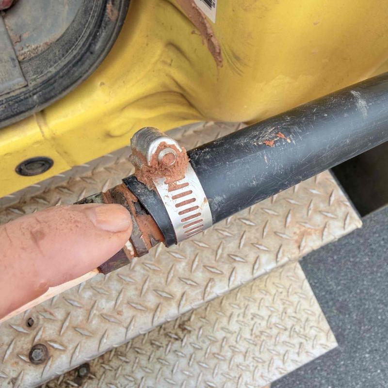 Underground pipe with clamp and leak damage