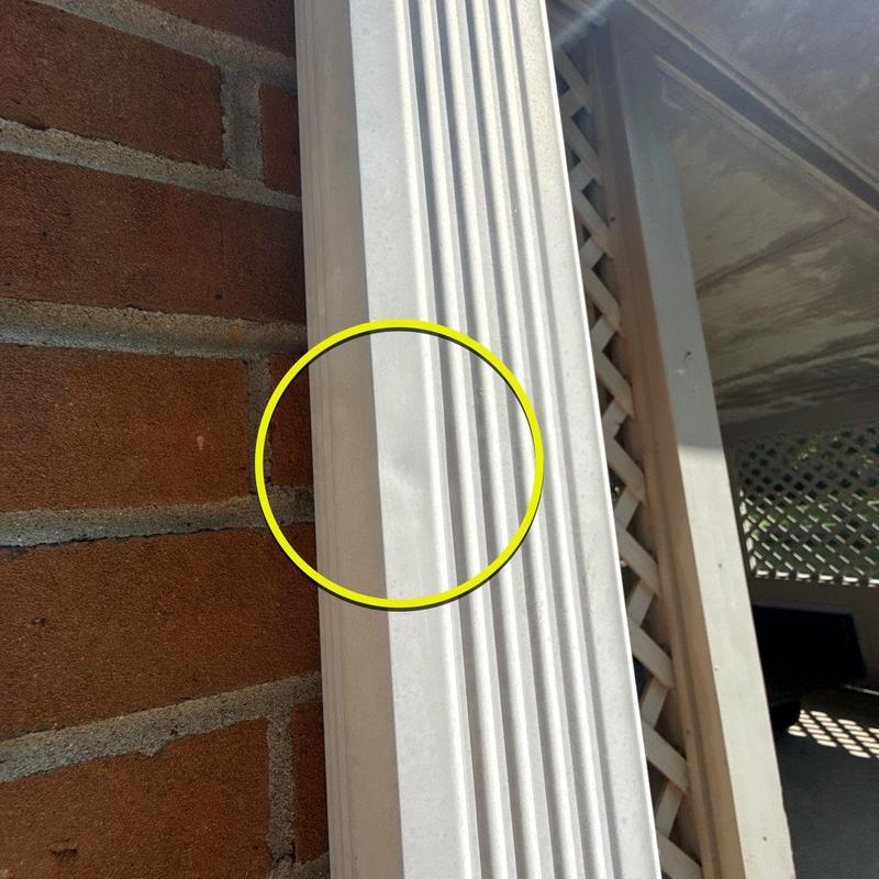 Vinyl column surface with discoloration detail highlighted