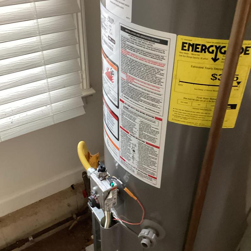 Water heater ignition system with wiring and gas line