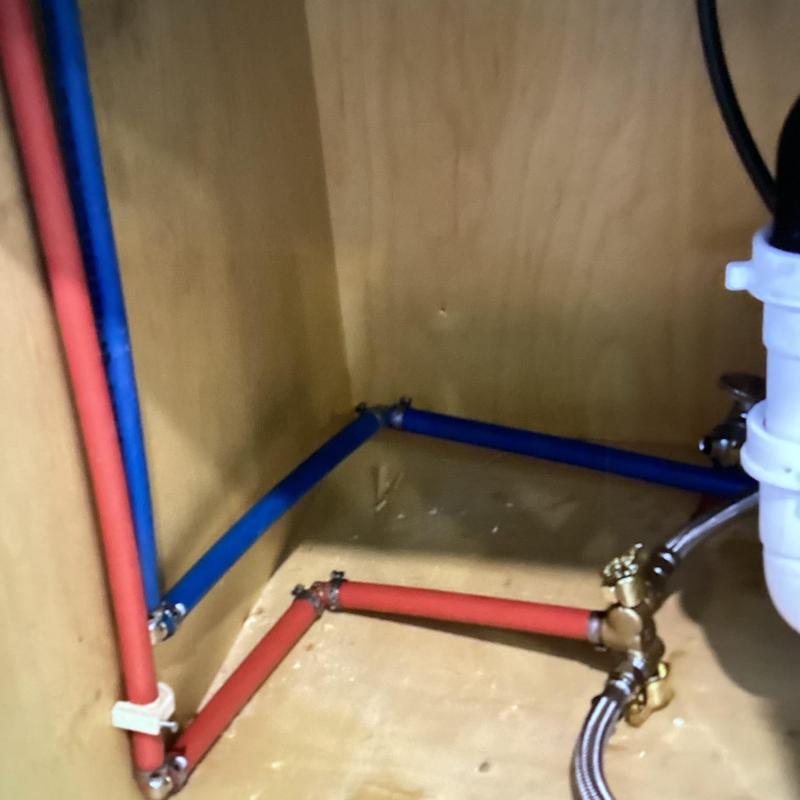 Kitchen water supply lines rerouting with PEX pipes