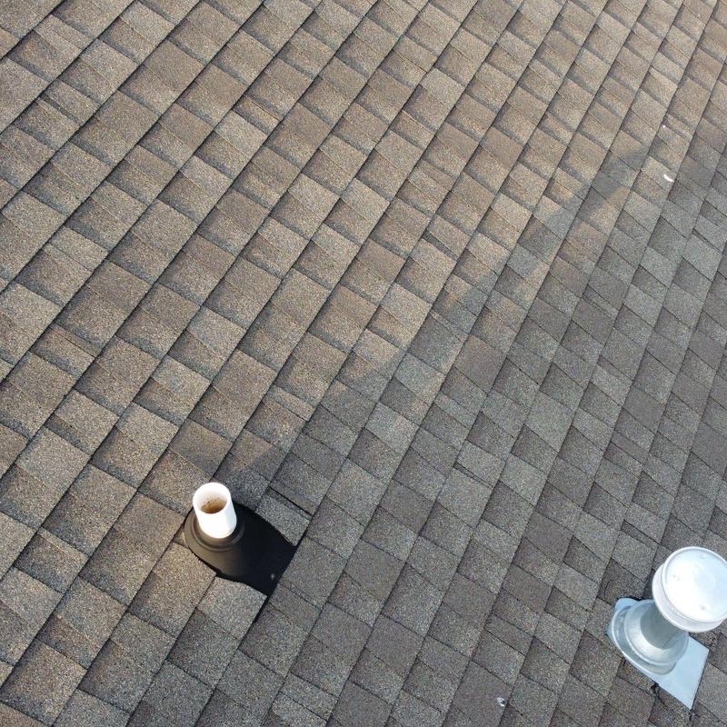 Architectural shingle roof with vent pipe and flashing