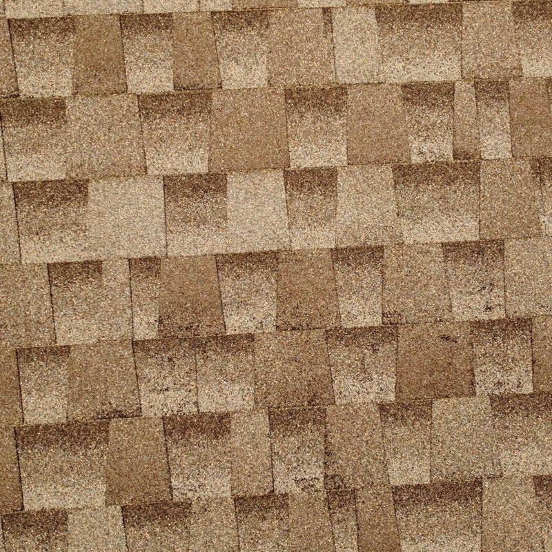 Architectural roof shingles with weathering and age damage