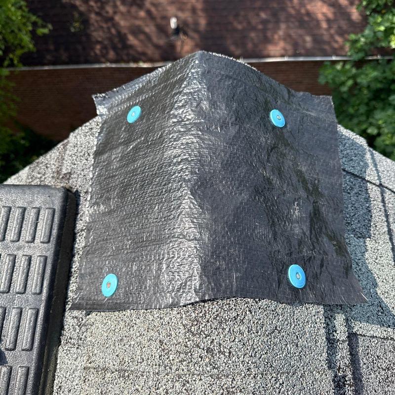 Roof ridge with waterproof underlayment and fasteners