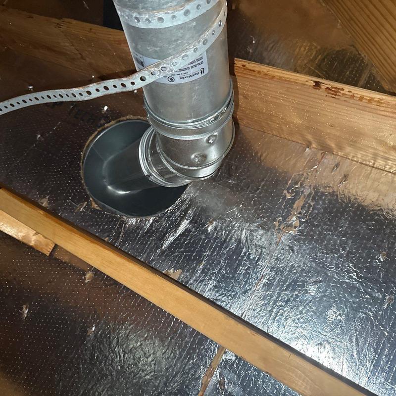 Metal roof vent pipe insulation with wood framing