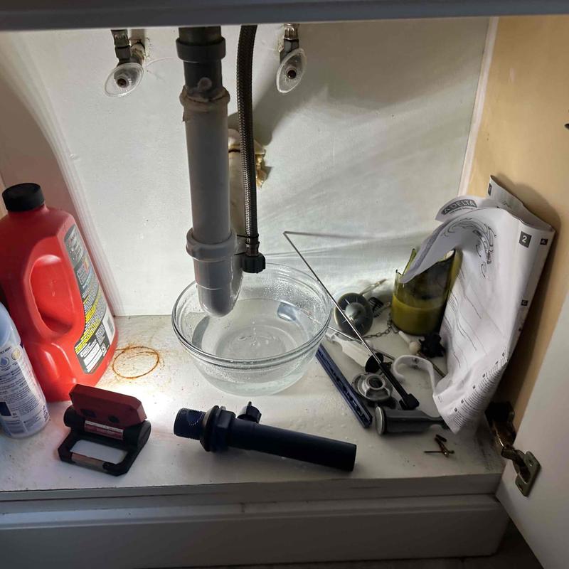 Pop up drain pipe installation under restroom sink