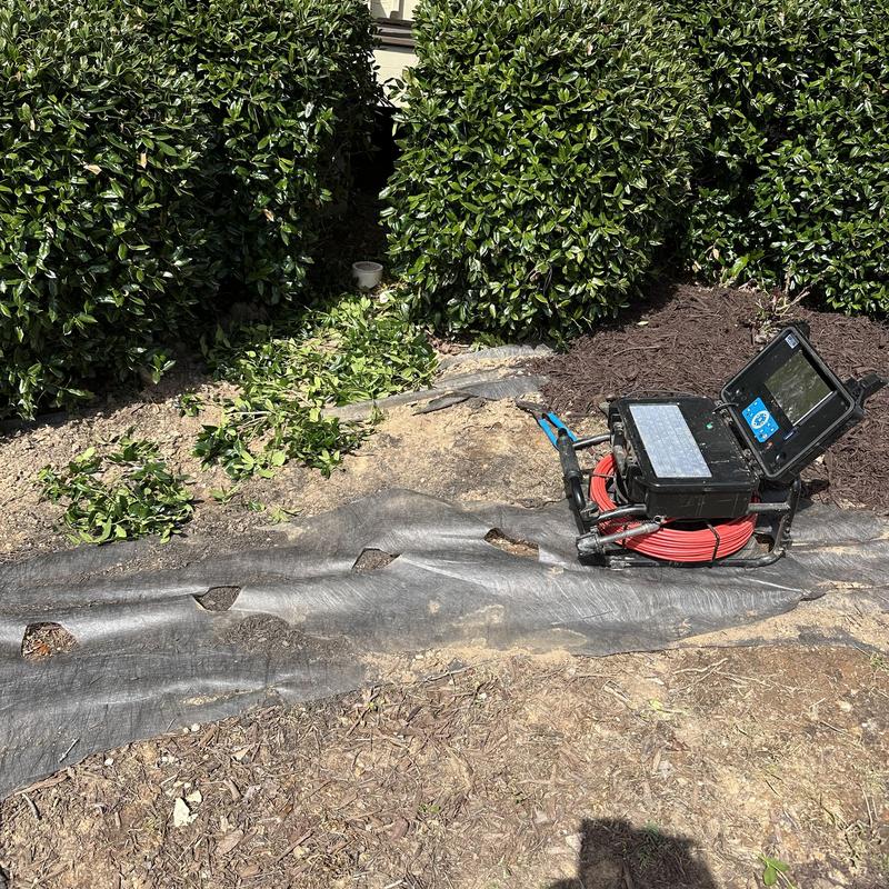 Main sewer line camera inspection with cable reel outdoors Main sewer line camera inspection with cable reel outdoors