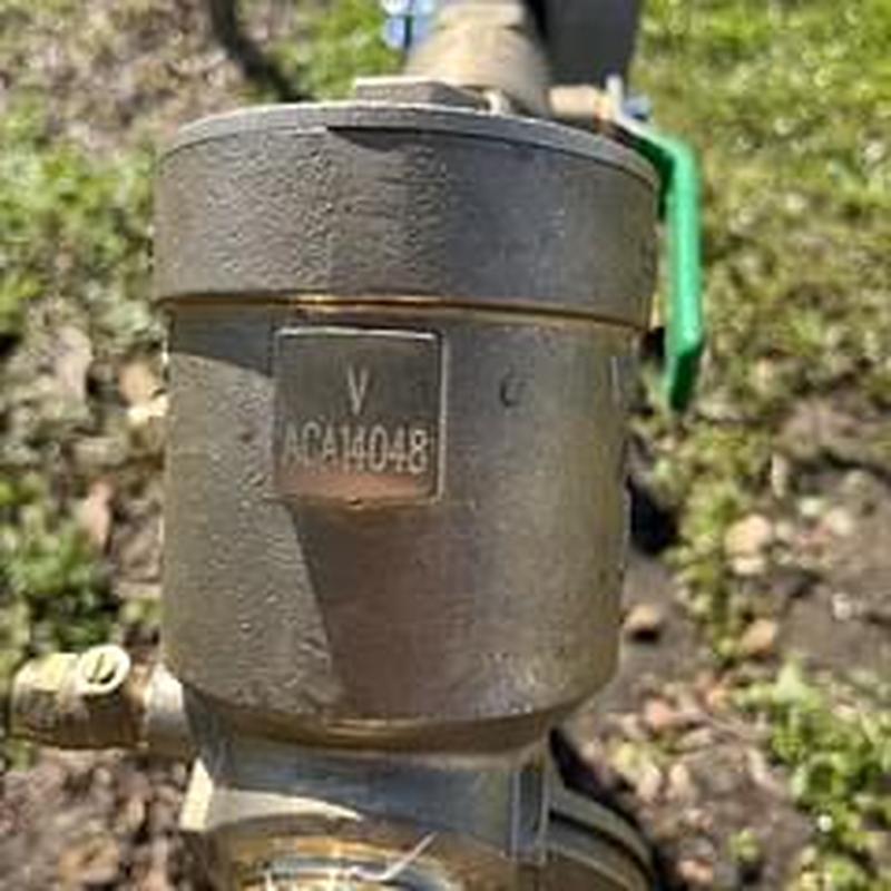 Wilkins 975XL2 backflow preventer with piping installation