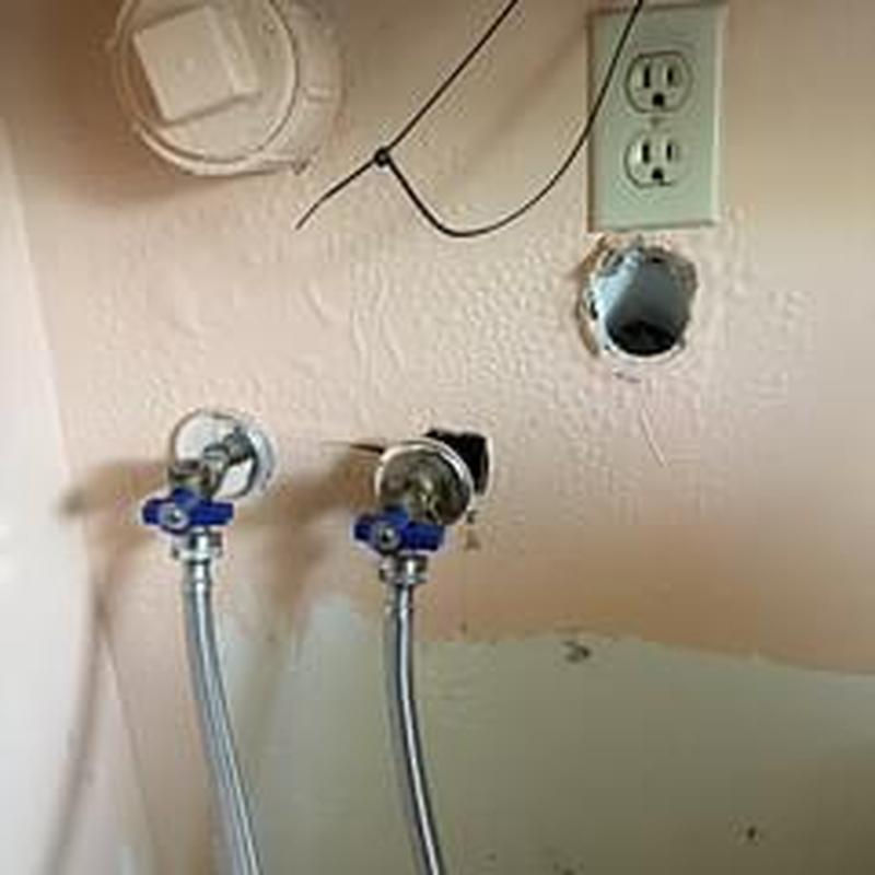 Hot and cold water hose bibs with wall cutout