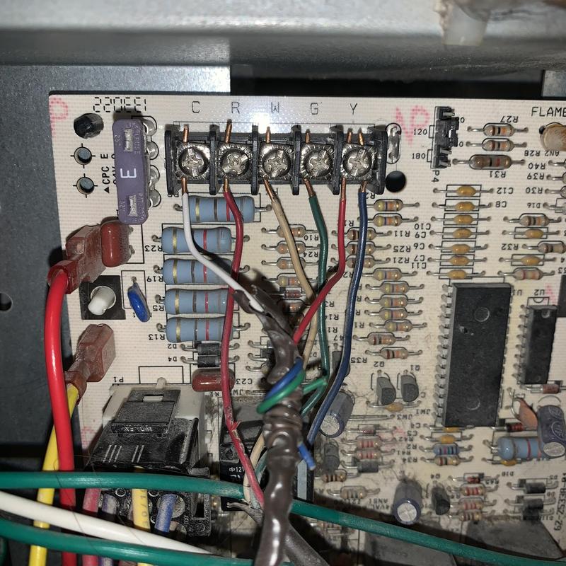 Furnace control board with wiring connections close-up