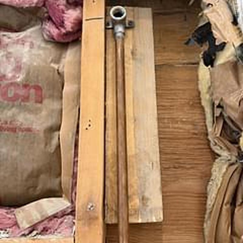 Shower drain pipe installed in framed bathroom wall