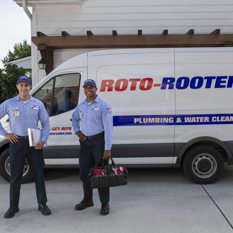 Septic tank excavation and riser installation crew