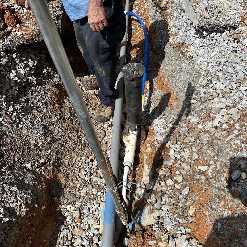 PEX waterline near buried faucets with gravel base