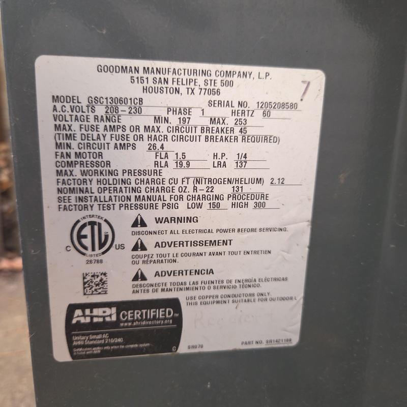Goodman AC unit model GSC130601CB label close-up