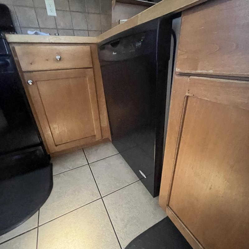 Dishwasher installation and plumbing rework in kitchen