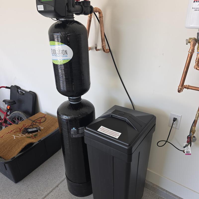 Water softener with built-in filtration system installation
