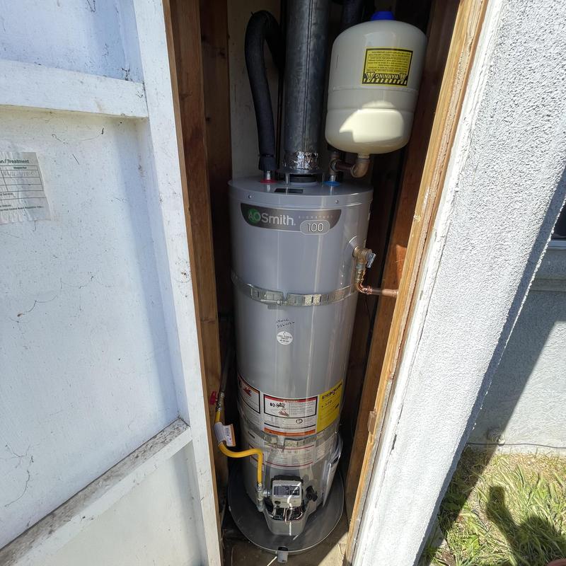 AO Smith water heater replacement in utility closet