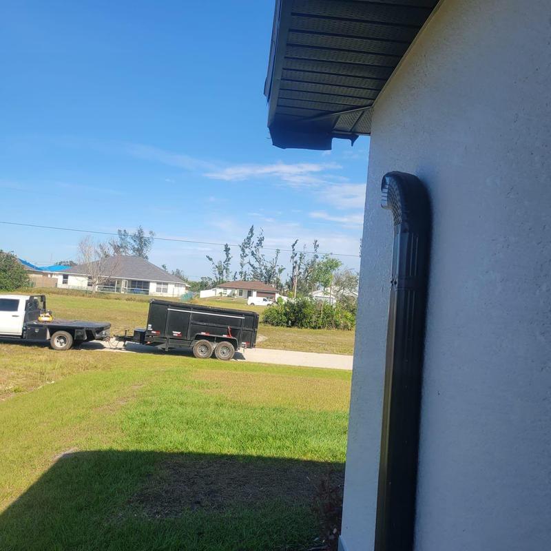 Gutter downspout inspection and roof soffit check Cape Coral
