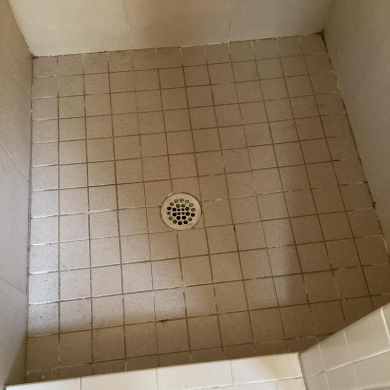 Shower drain with copper P-trap and tiled floor