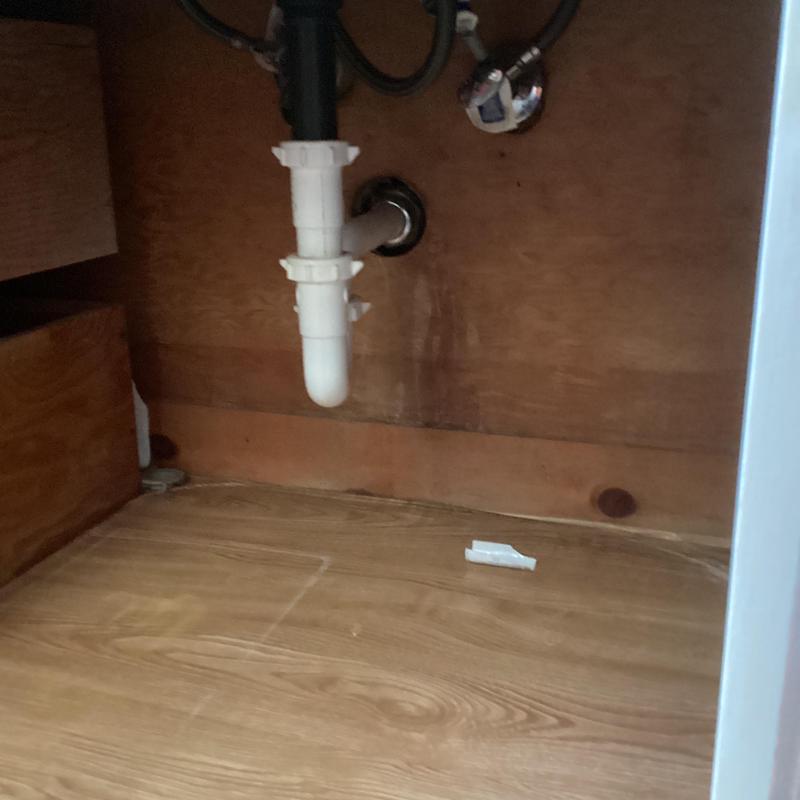 Bathroom vanity drain and plumbing under sink